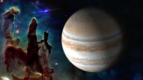 Outer space. Jupiter rotating near pillar of creation. Motion 4K video footage. Elements of this image furnished by NASA