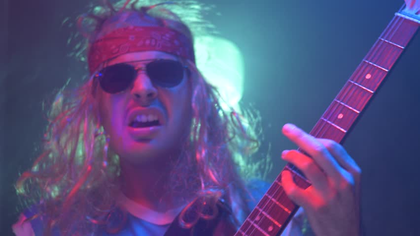 Old Style 80s 90s Rocker Stock Footage Video (100% Royalty-free