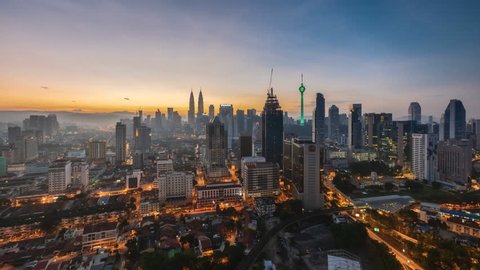Time lapse: Beautiful Kuala Lumpur city view during dawn overlooking the city skyline. Motion timelapse move up. Prores 4K.