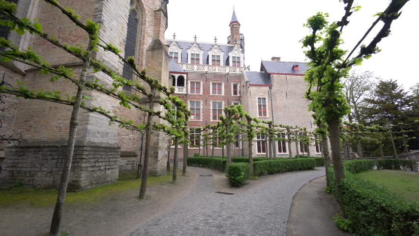 Exterior view of the famous Church of Our Lady Bruges and Juan Luis Vives, Belgium