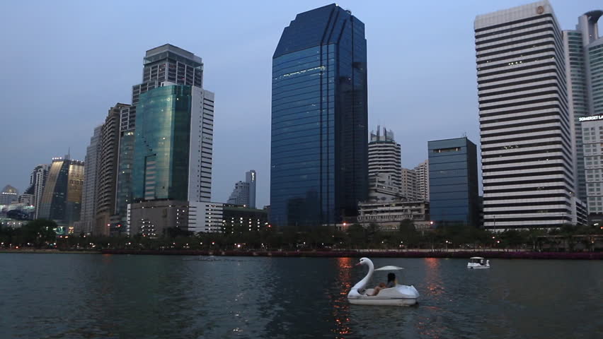 Bangkok, Thailand, March 2016: Sailing with a swan boat in Benjakiti Park. | Shutterstock HD Video #1016228227
