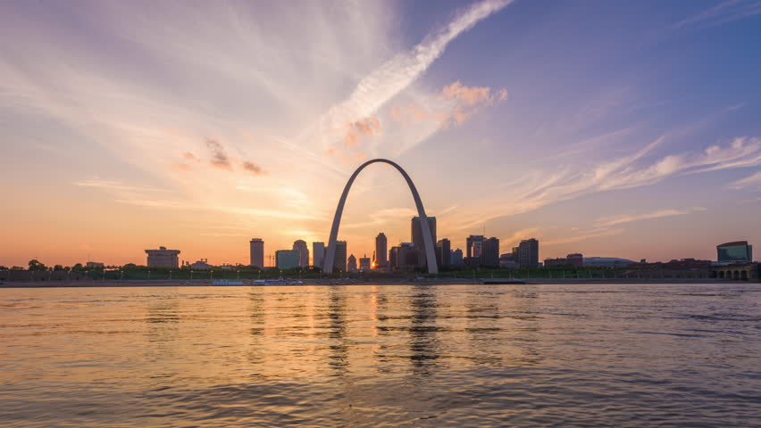 St. Louis, Missouri, USA downtown cityscape on the Mississippi River at dusk.