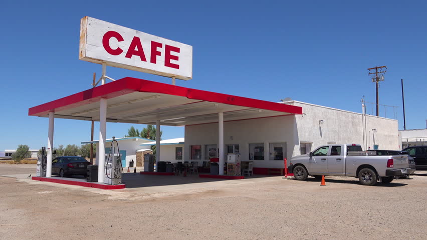 CIRCA 2018 - Establishing shot of a lonely desert gas station and hotel motel cafe in the Mojave Desert.