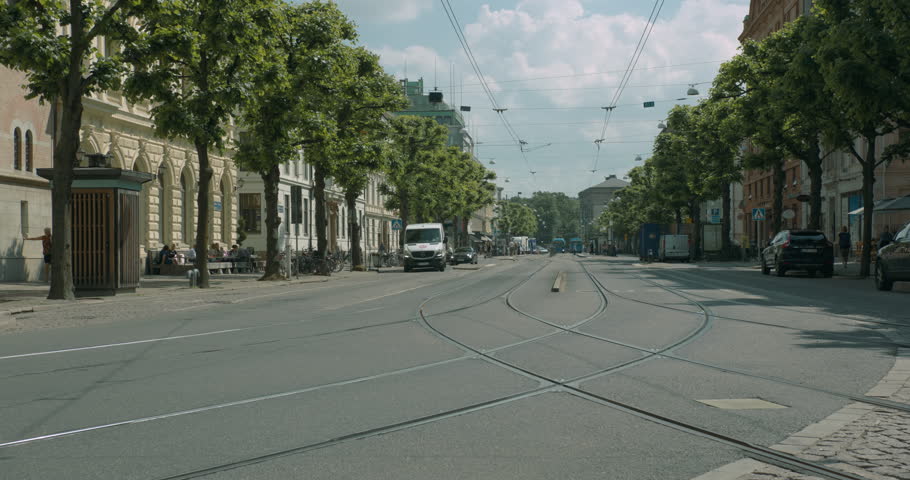 Traffic and people on a beautiful boulevard in central Gothenburg. Gothenburg, Sweden	