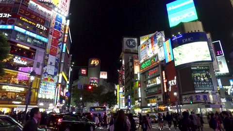SHIBUYA,  TOKYO,  JAPAN - NOVEMBER 2017 : View of SHIBUYA scramble crossing area at night.  Shot with stabilizer camera.
