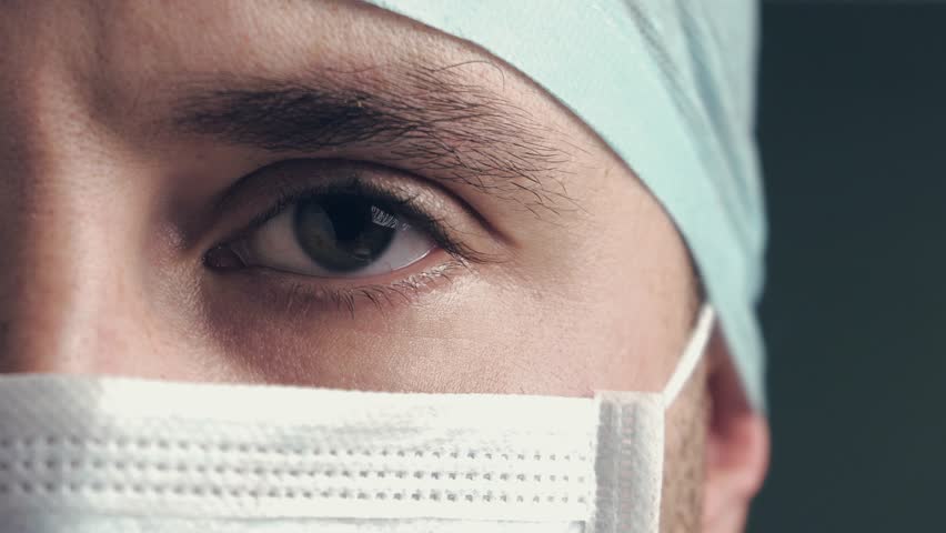 Portrait of a physician or surgeon who looks proud room, happy and smiling for his work in the clinic or hospital. Concept: doctor, patient care, health and wellness in hospitals or covid 2019 Royalty-Free Stock Footage #1016249170