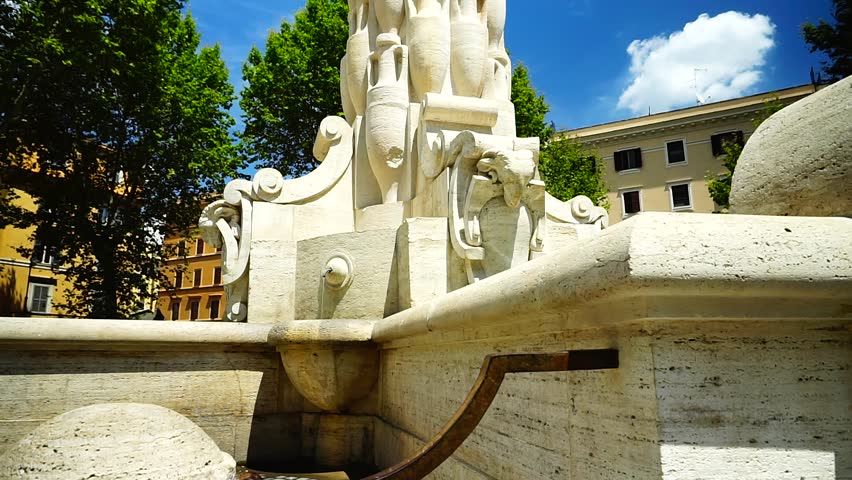 view of the public fountain of the amphorae in the Testaccio district of Rome