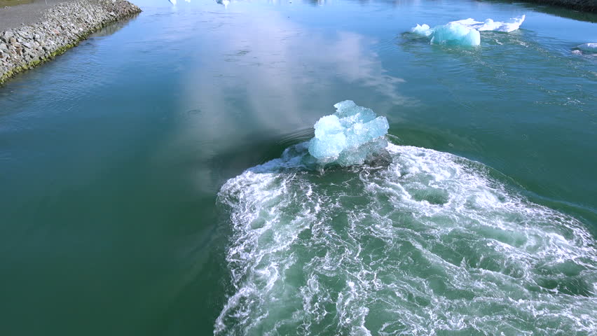 ICELAND - CIRCA 2018 - Icebergs in a river in the frozen Arctic, Jokulsarlon, glacier lagoon in Iceland, suggesting global warming.