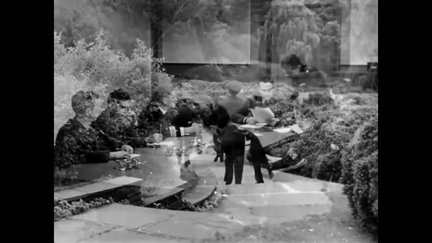 CIRCA 1950s - Airmen meet and sign nondisclosure agreements at the evasion and escape headquarters in Washington, D.C.