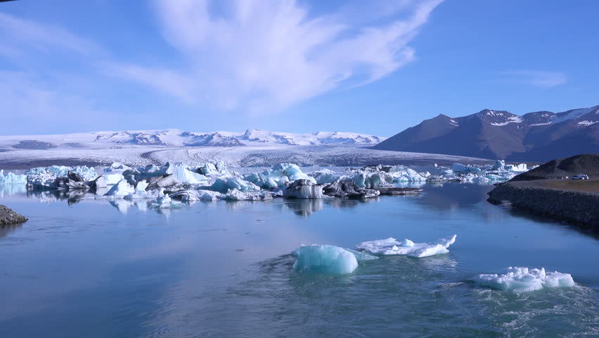 ICELAND - CIRCA 2018 - Icebergs in a river in the frozen Arctic, Jokulsarlon, glacier lagoon in Iceland, suggesting global warming.