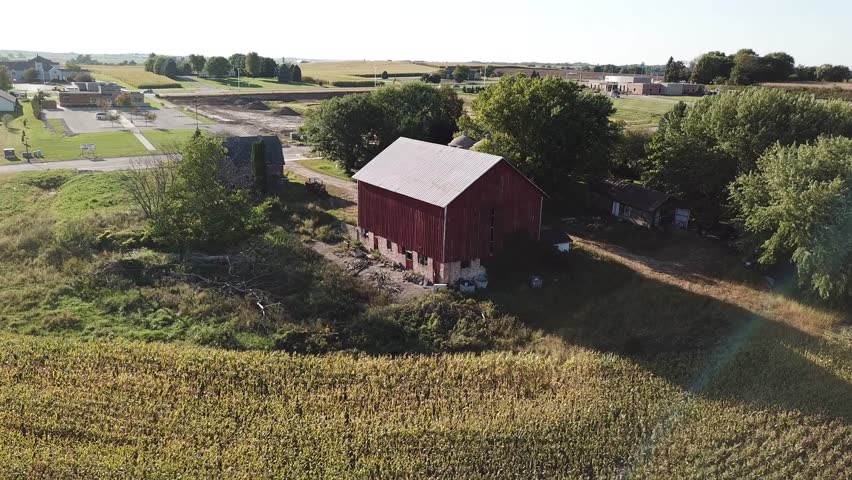 Red Barn in Rural Wisconsin Surrounded by Corn Fields