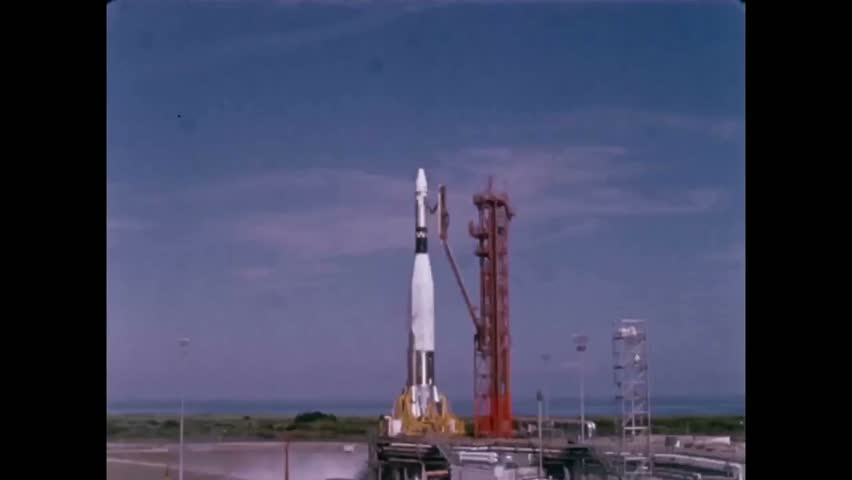 CIRCA 1960s - A Project Gemini rocket lifts off from Launch Complex 19 at Cape Kennedy Air Force Station in Florida and astronauts are shown. Royalty-Free Stock Footage #1016275600