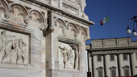 Milan, Duomo Dome Cathedral Close Up Detail with Italian Flag Moving Background