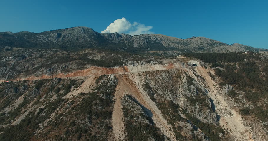 Aerial 4K: Mountain road with cars traffic