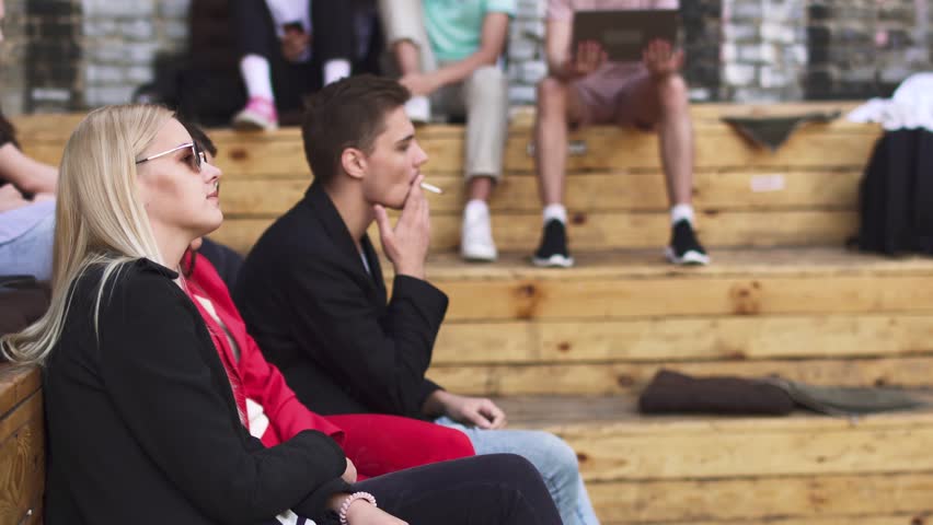 Girl and boy high five to each other