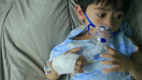 Asian boy sick with pneumonia