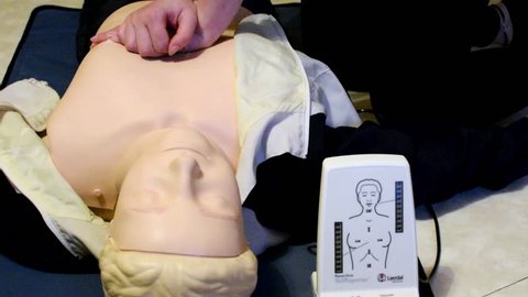 AURA, FINLAND - November 4, 2017: CPR training with CPR doll Resusci Anne and SkillReporter