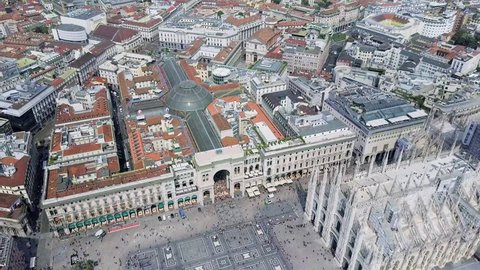 Aerial view of Duomo di Milano, Galleria Vittorio Emanuele II in Piazza del Duomo with people walking