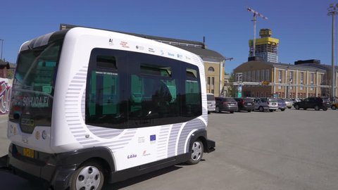 HELSINKI, FINLAND - MAY 25, 2018: Automated remotely operated bus in Helsinki. Unmanned public transport on street.