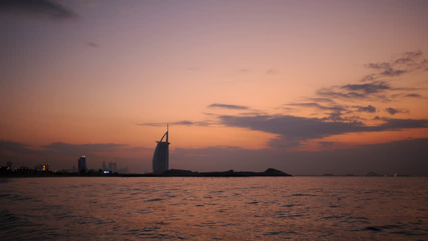 Time Lapse of Dubai City with Famous Burj Al Arab Hotel Luxury Landmark Sunset