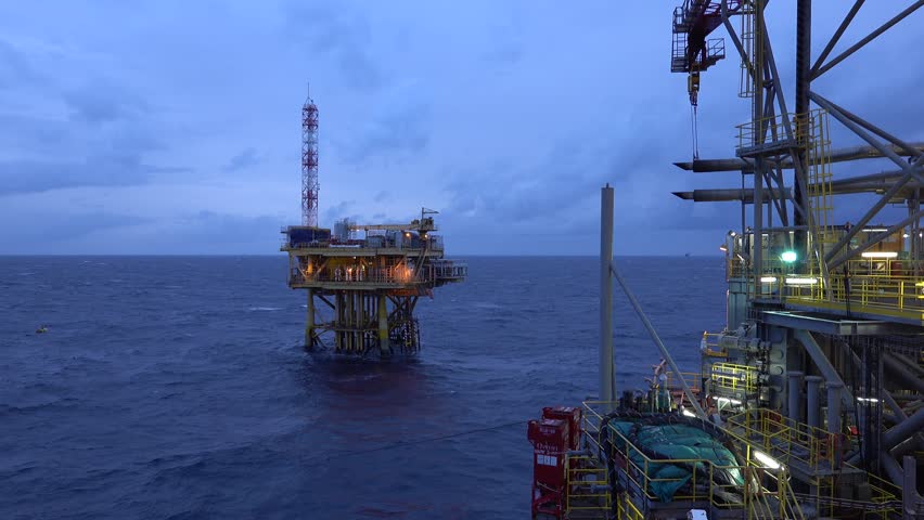 Jack up rig with oil platform at night | Shutterstock HD Video #1016329894