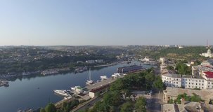 Shooting from the air of Sevastopol South bay, moored ships, yachts, dry dock