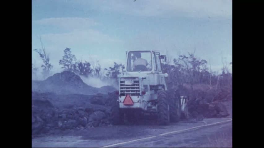 CIRCA 1973 - Construction plows are used to shift rocks in the aftermath of Pauahi Crater