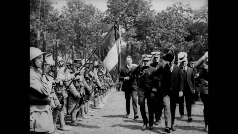 CIRCA 1919 - President Wilson, Admiral Grayson, and Marshal Foch arrive at a military cemetery in Suresnes, France.