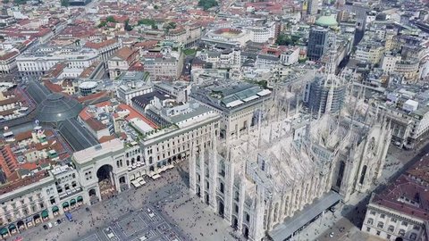 Aerial view of Duomo di Milano, Galleria Vittorio Emanuele II in Piazza del Duomo with people walking