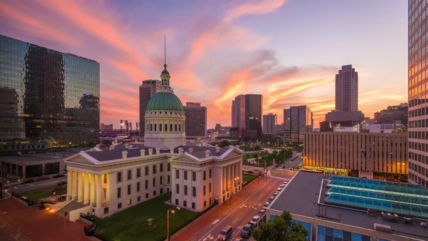 St. Louis, Missouri, USA downtown cityscape with the old courthouse at dusk.