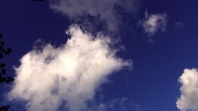 White clouds moving. Time lapse video full hd