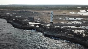 Lighthouse sea beach coast Bonaire island Caribbean sea aerial drone top view 4K UHD video 