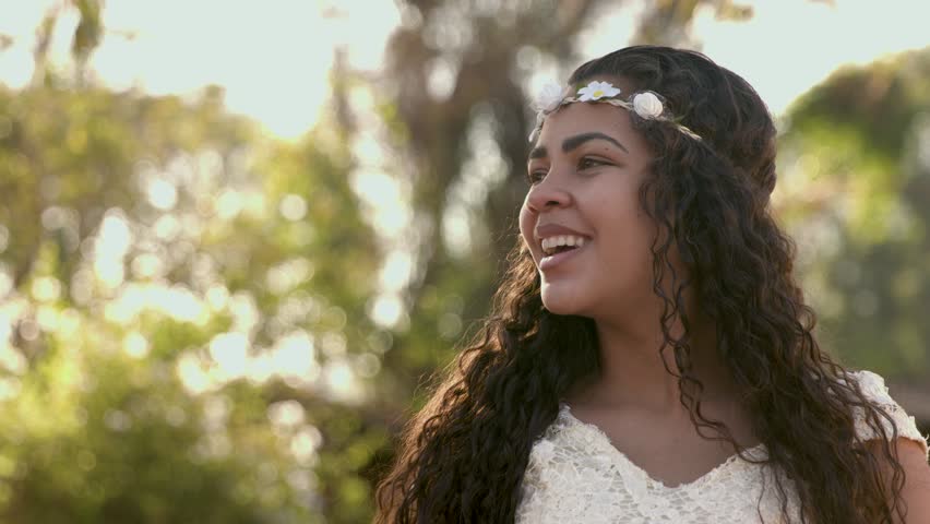 Young girl using crown of flower. Crown daisy flower with fern, headband design. 4k. Cinematic Premium Video.