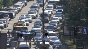 City car-loaded street in the city of Kiev, Ukraine, September 2018 with zooming effect