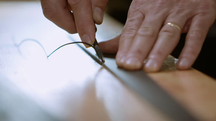 Bevelling Edge of Leather Belt Slow Motion