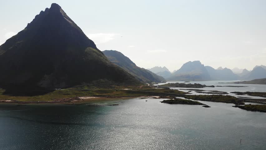 Sea with mountains, norwegian summer landscape on Lofoten archipelago Nordland county, Norway. Tourist attraction