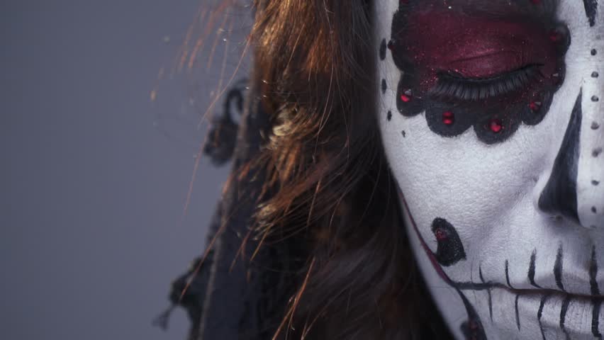 Dead girl, makeup Santa Muerte for Halloween. Close up