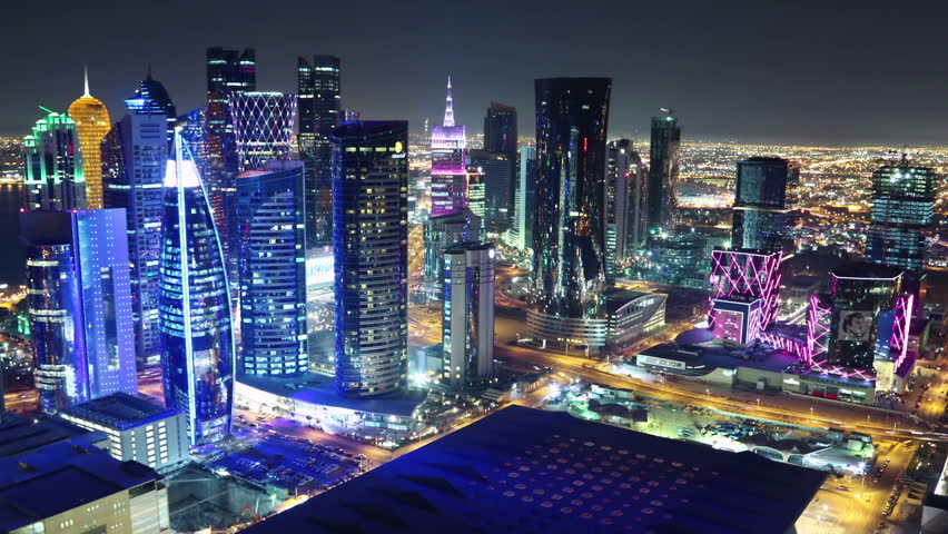 QATAR, DOHA, MARCH 20, 2018: Night rooftop cityscape panorama timelapse of financial centre in Doha - capital and most populous city in Qatar, West Bay, Persian Gulf, Arabian Peninsula, Middle East | Shutterstock HD Video #1016370316