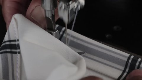 Old Sewing Machine on fabric slow motion