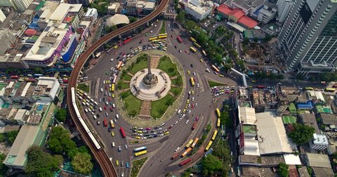 Thailand Bangkok Aerial v136 Panning birdseye above Victory Monument to cityscape view