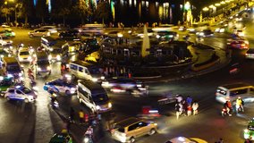 Timelapse or time lapse of a lot of unidentified people drive by motor, motorcycles, car, bus, truck and walking on street at roundabout in Dalat center market, Vietnam. Timelapse is fast video