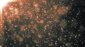 Space orange background with particles. Space gold dust with stars. Sunlight of beams and gloss of particles galaxies.