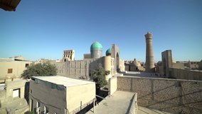 Panoramic view of the complex Poi Kolon at sunset in Bukhara, Uzbekistan. UNESCO world Heritage. slow motion video