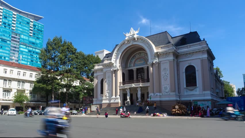 Timelapse or time lapse video footage of Greco Roman Woman Statues Old Opera House Municipal Theater, known as Saigon Opera House built in 1899 by the French Saigon Ho Chi Minh City Vietnam