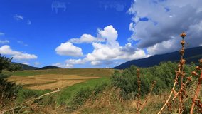 time lapse of countryside landscape in Capcir with moving cumulus clouds, Pyrenees orientales  in southern of France
