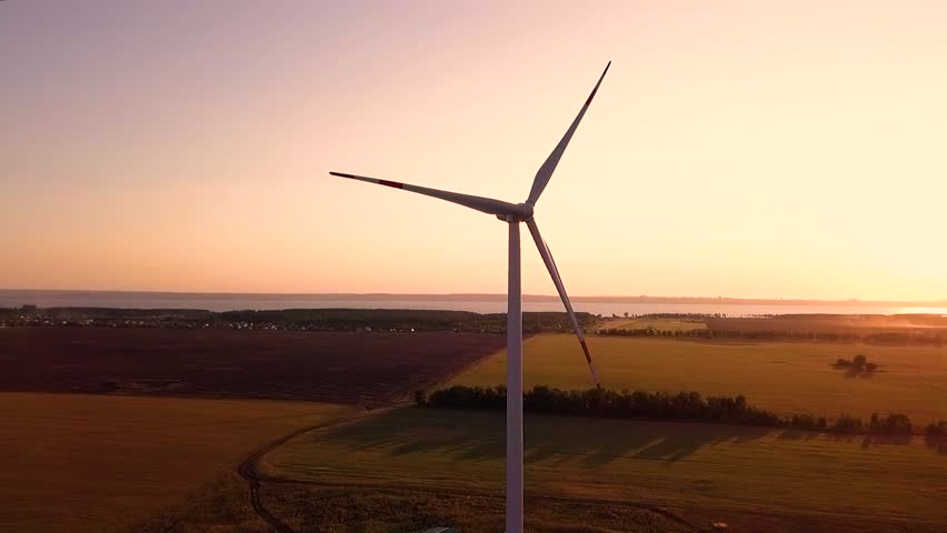 Wind power generators at sunset | Shutterstock HD Video #1016436193