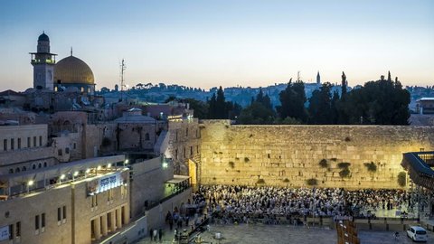 Time-lapse of sunrise prayers at the Western Wall in the Days of Awe, preceding Yom Kippur/ Day of Atonement. The banner is announcing "Prayers of Repentance at the Western Wall".