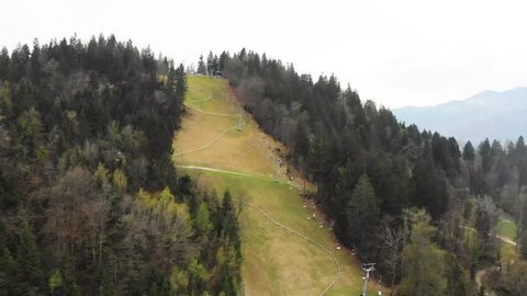 Aerial footage of the public recreational bobsled track next to Lake Bled in Slovenia.