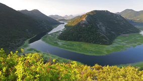 Unbelievable morning view of Canyon of Rijeka Crnojevica river, Skadar lake lacation. Great summer scene of Montenegro countryside. Full HD video (High Definition).