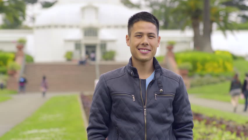 Attractive Man Smiles Happily In Beautiful Botanical Garden In San Francisco (4K)